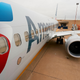 Imagen para el artículo titulado Un avión de American Airlines realiza un aterrizaje de emergencia después de que un pasajero intente entrar en la cabina